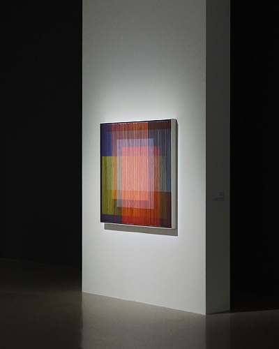indoors multicolored abstract painting on wall interior design